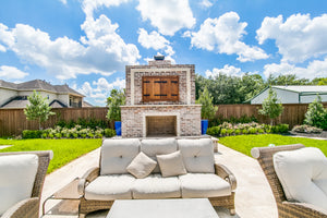 outdoor fireplace built by Backyard Retreats